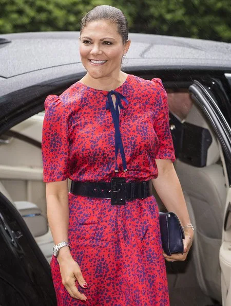 Princess Victoria wore Ralph Lauren Suede Celia Pump and carried Quidam Clutch. The dress worn by Princess Victoria is an old dress of her mother Queen Silvia