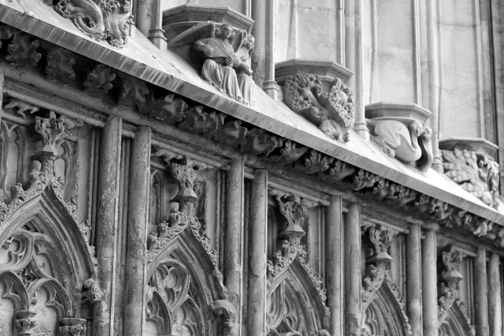 Carved stone church details in Girona, Spain - travel & lifestyle blog