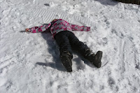 Image result for kids making snow angels