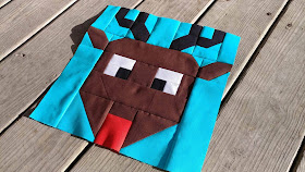 Reindeer Games Rudolph quilt block for the I Wish You a Merry QAL
