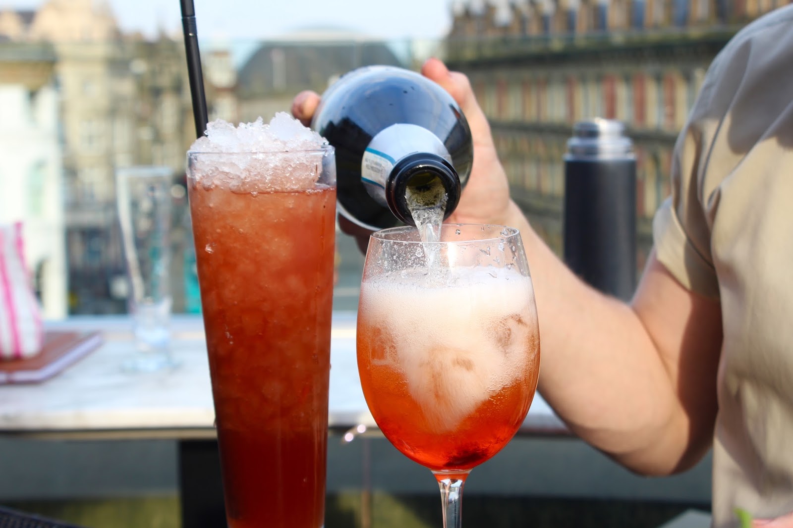 Bar tender making cocktail Padua Punch