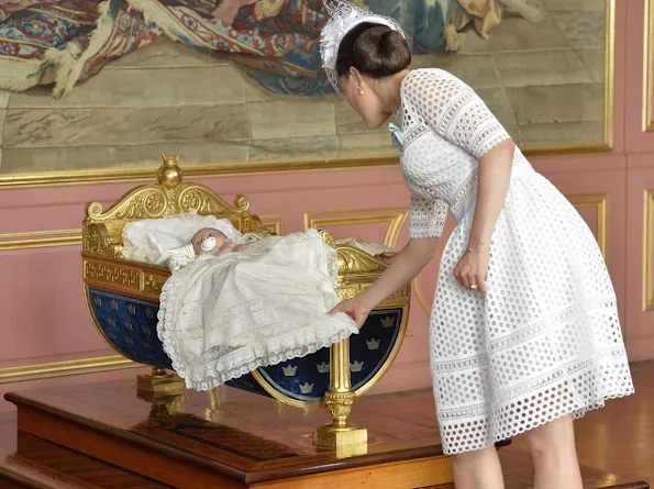 Queen Silvia and King Carl Gustaf of Sweden, Crown Princess Victoria, Prince Daniel, Princess Estelle, Princess Madeleine of Sweden with daughter Princess Leonore and Christopher O'Neill, Prince Carl Philip and Princess Sofia, Prince Haakon and Princess Mette-Marit of Norway, Crown princess Mary and Prince Frederik of Denmark, Ewa and Olle Westling at the christening of Prince Oscar of Sweden at the Royal Chapel in Stockholm.Antonio Berardi Blue Cape-back Stretch Crepe Dress