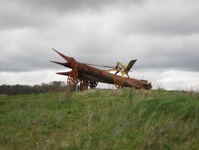 Ichthyosaurs with throne as driving seat - Andy Kirkby sculpture, Weymouth