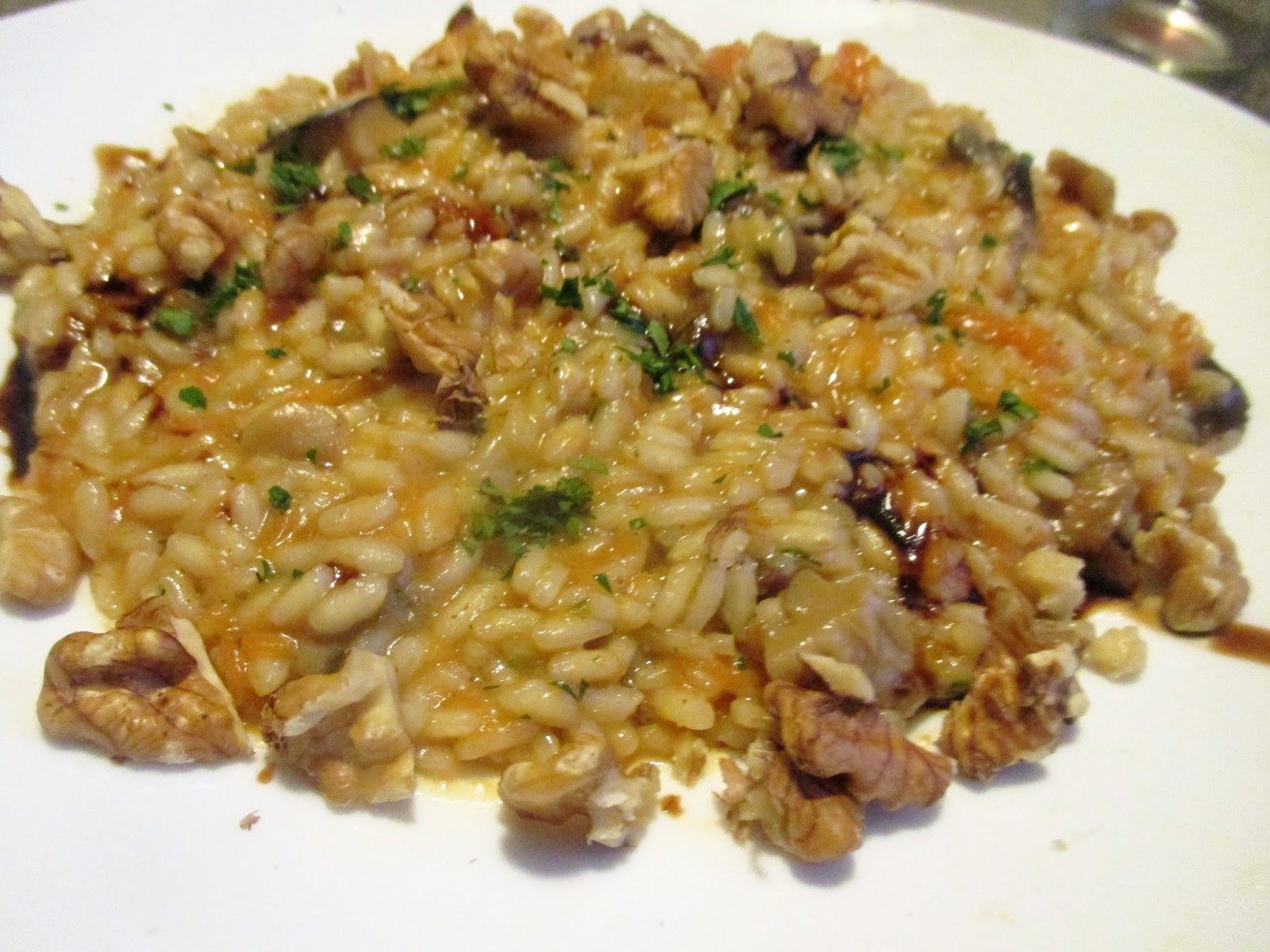 RISOTTO PUMPKIN, PORCINI MUSHROOMS AND WALNUTS Risotto alla zucca con