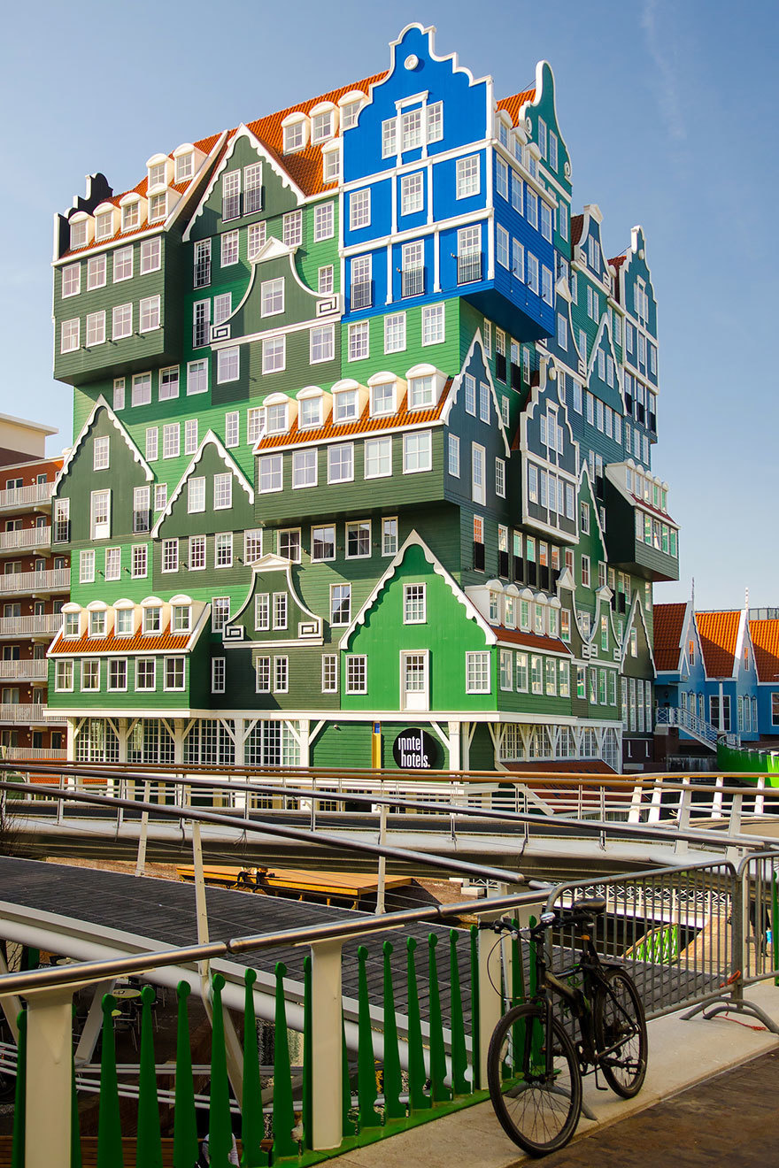  14 Crazy Hotels That Will Give You Serious Travel Goals - The Amsterdam Zaandam Inntel Hotel in the Netherlands looks like a puzzle and takes its inspiration from historic Dutch architecture: Whimsical, bright, and totally fresh.
