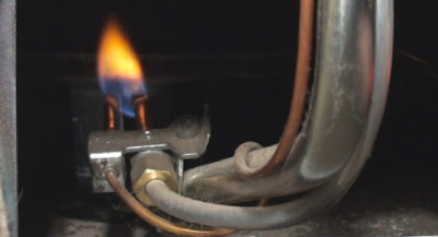 closeup of natural gas pilot light burning