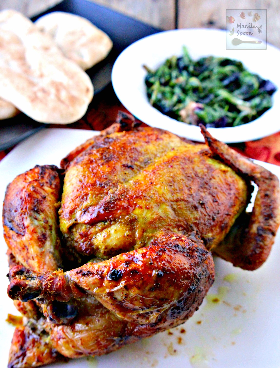 Flavored with aromatic spices, this whole roast Masala Chicken (Indian-style) comes out so yummy! The skin is deliciously crisp and the meat is tender and moist. This roast is very easy and quick to prepare, too. | manilaspoon.com
