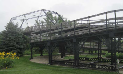 Spiral bridge ramp reaching to main span