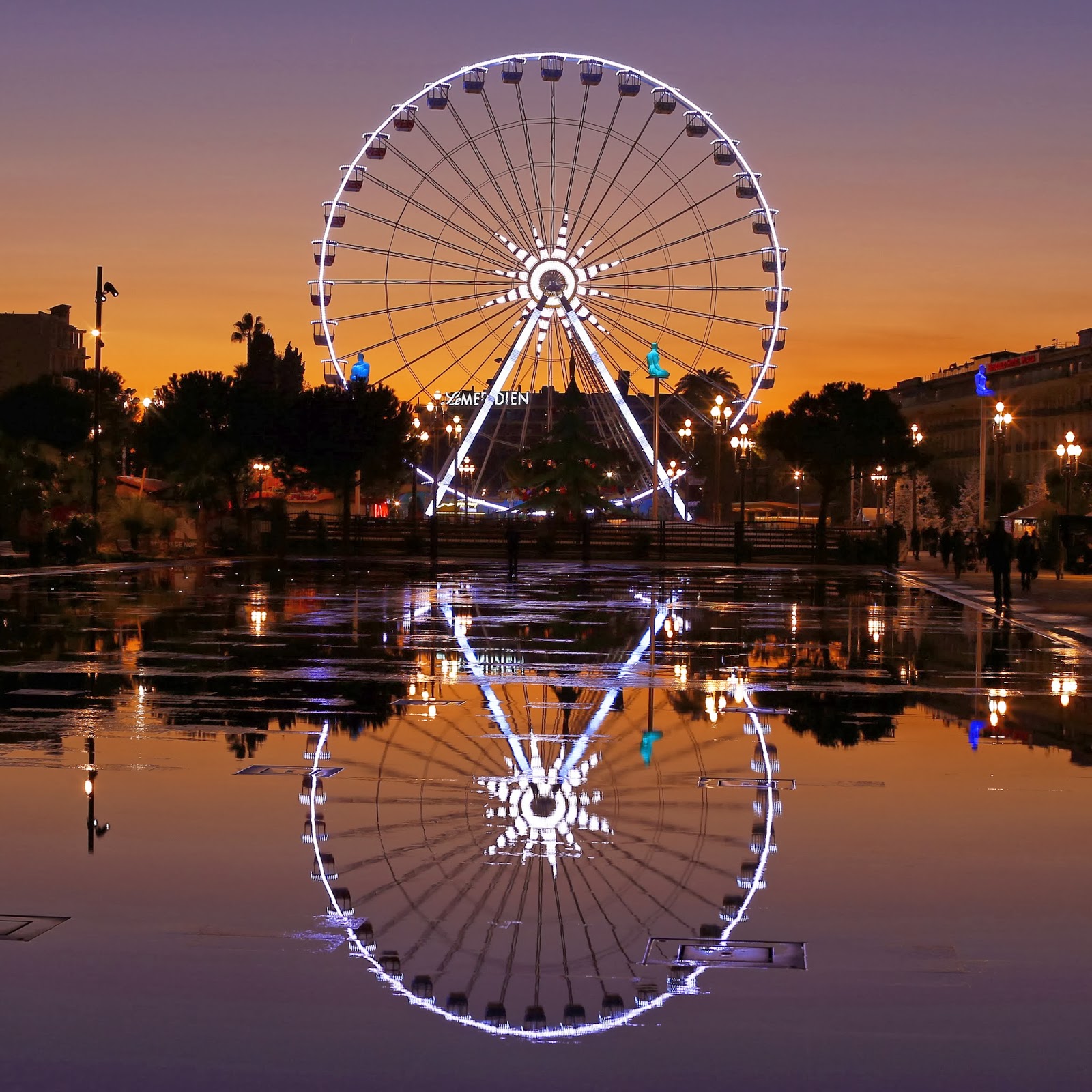 Ferris Wheel Reflected in Water.