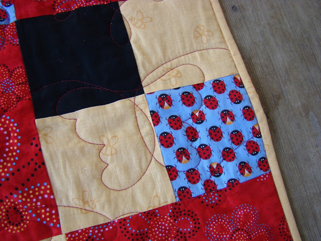 Quick and easy four patch baby quilt
