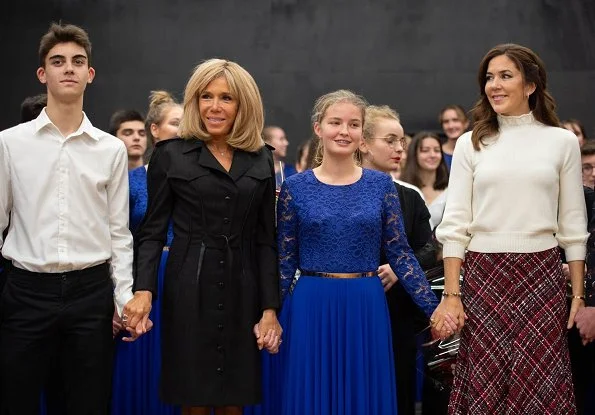 Crown Princess Mary wore a high-waisted bouclé tweed midi skirt by Alexander McQueen. he DR Danish National Girls’ Choir