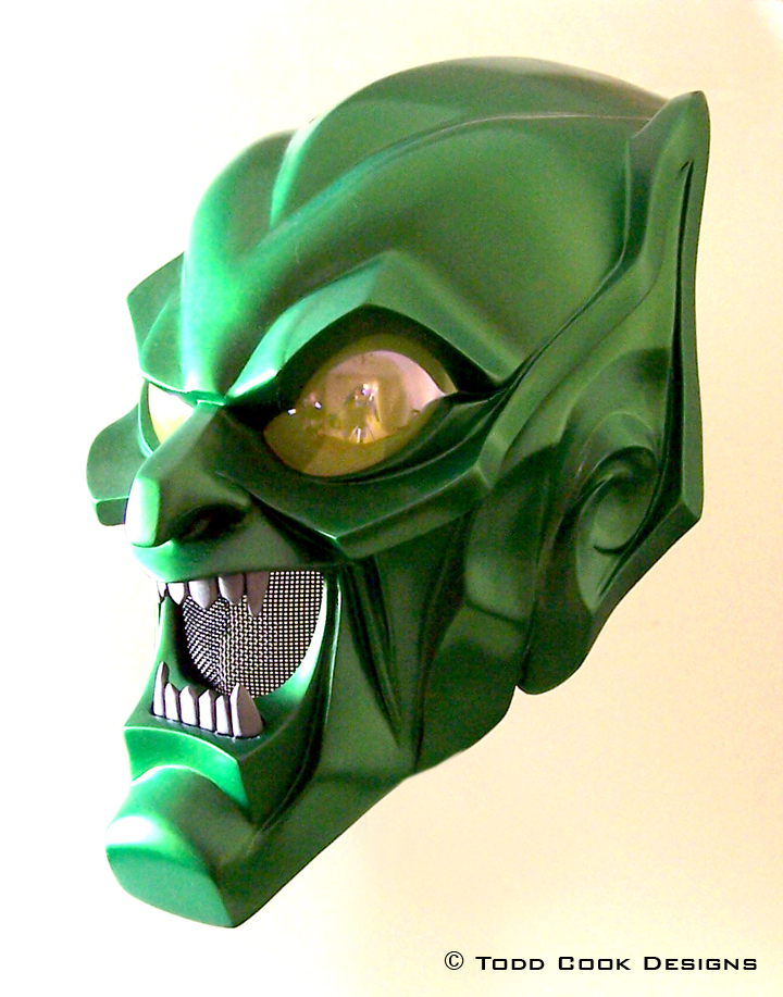 Masking зеленая. Mask Green Goblin 2002. Зелёный Гоблин 2002 шлем. Маска зеленый Гоблин человек паук 2002. Маска зеленого Гоблина сбоку.
