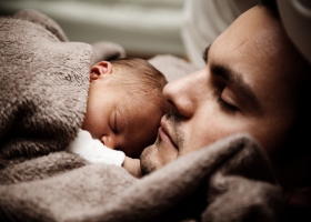 Father and son asleep. Father and son asleep.