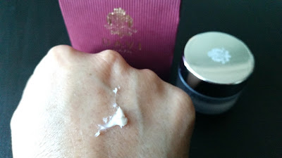 small amount of cream on the back of hand