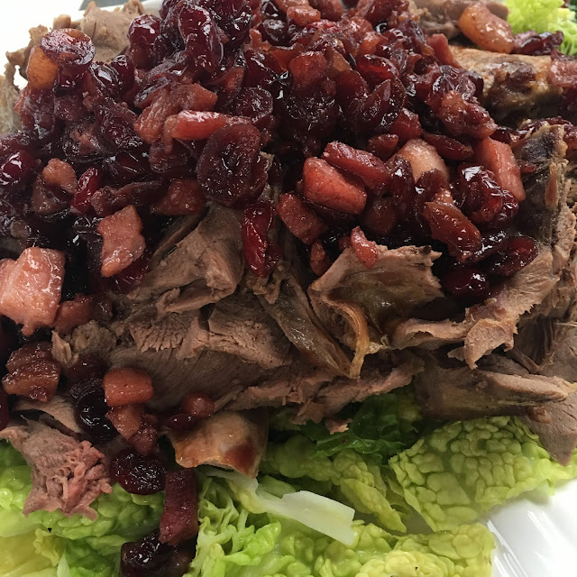 Roast muntjac with savoy cabbage, smoked bacon & cranberries in port