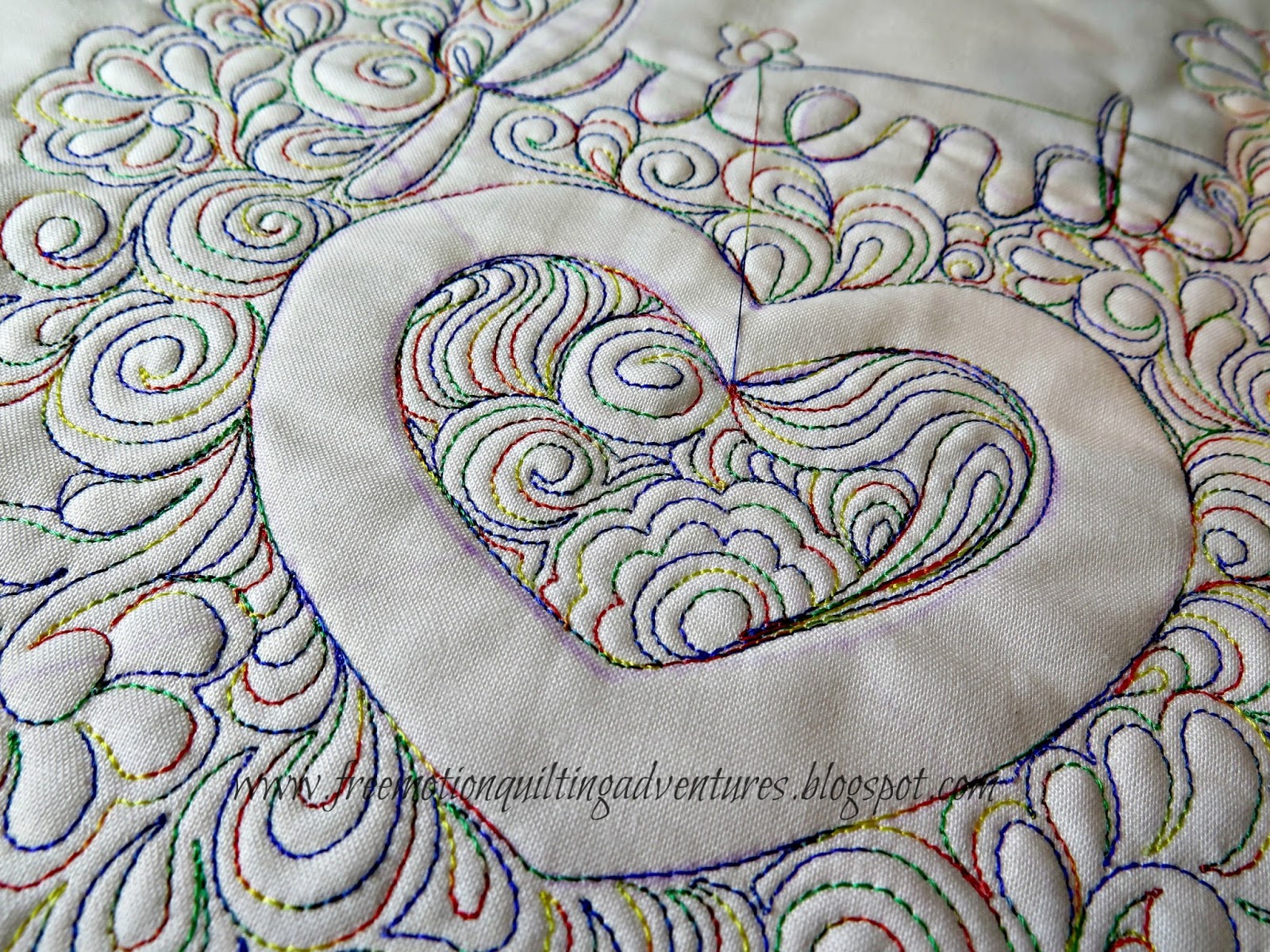 Heart free motion quilted