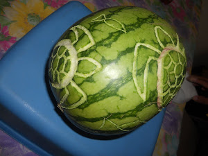 CARVING WATERMELON