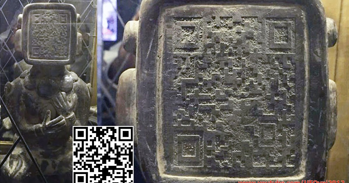 Maya antique Statue A code sur le visage.