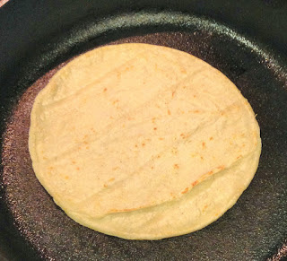 Corn Tortillas in a Cast-Iron Skillet for Smoked Pork Shoulder Tacos with Ancho-Bourbon Sauce and Fresh Peach-Habanero Salsa