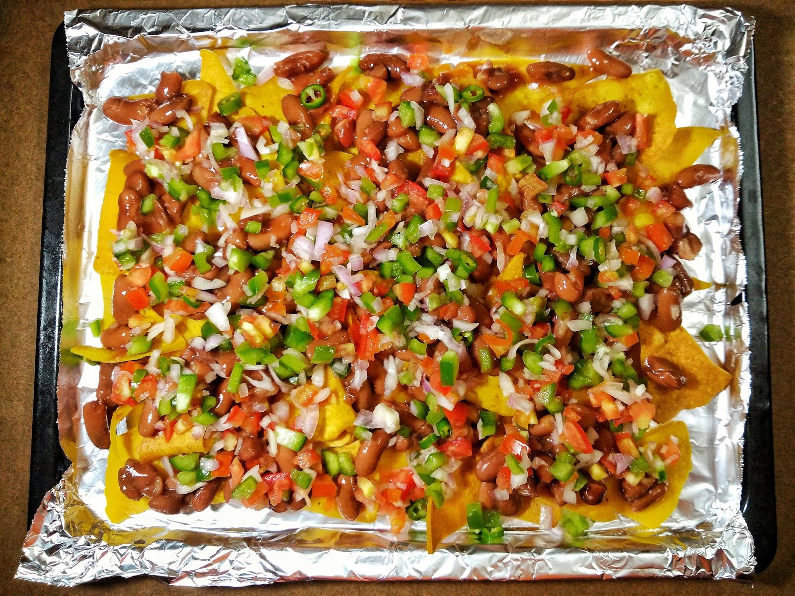 Nachos Supreme with Kidney Beans and Veggies Loaded Vegetarian Nachos Tempting Treat