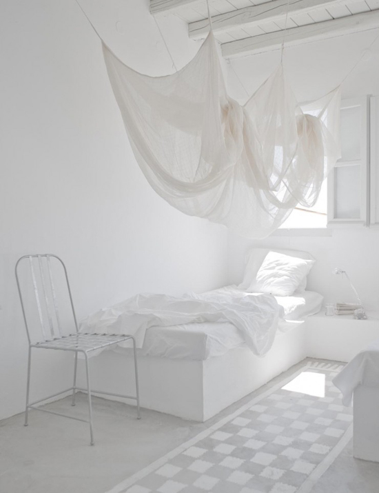 Mosquito protection in bedroom with sheer bed nets. #bedroom #mosquitonet