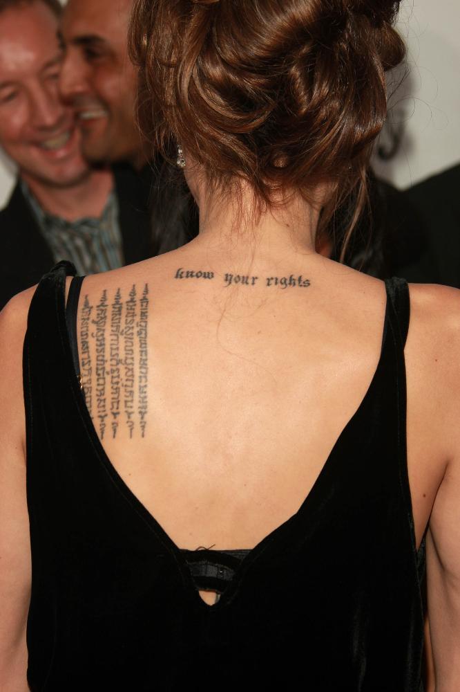 girl tattoos on shoulder. quote tattoos for ribs. short