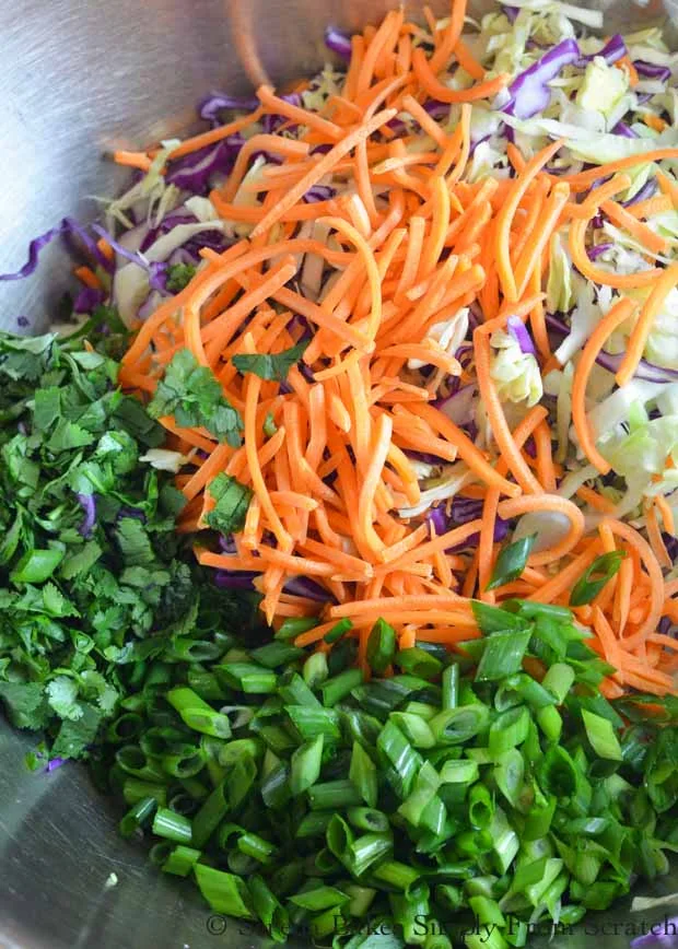 Asian Coleslaw with cabbage, carrots, green onion and cilantro from Serena Bakes Simply From Scratch.
