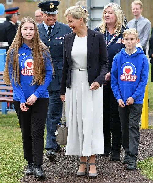 The Countess of Wessex wore Max Mara belted stretch-cady midi dress. Countess Sophie wore a white cady dress by MaxMara