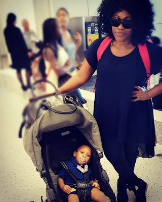 Photo of actress Uche Jombo and her son Matthew at a US Airport 