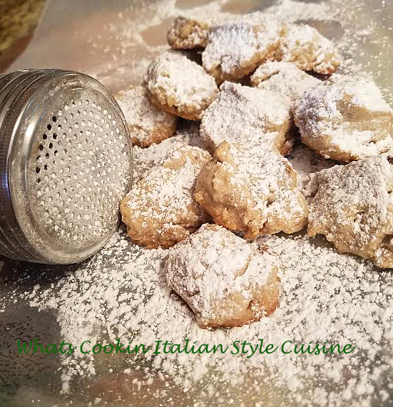 these are a butter cookie with powdered sugar on top the can is in the photo to sprinkle the sugar it has holes in it