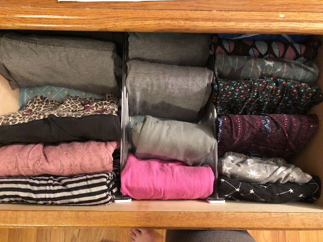 organized dresser drawer using clear drawer dividers from container store