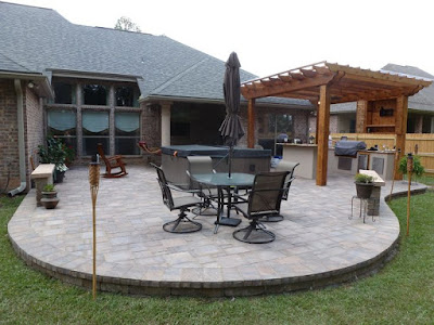 Round Block Backyard Pavers With Iron Round Table And Chairs As Small Patio Decors As Well
