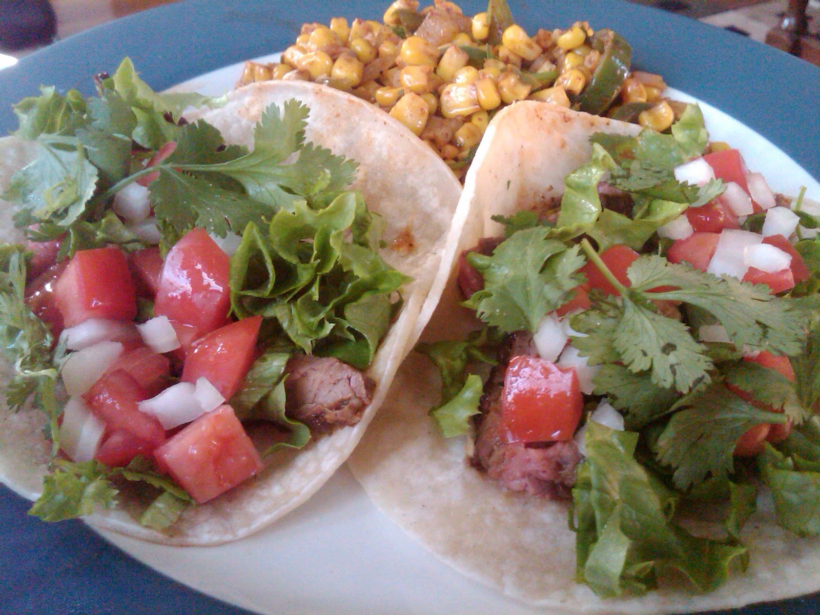 Legally Delicious Triple Sec Marinated Skirt Steak Tacos with Sauteed Corn