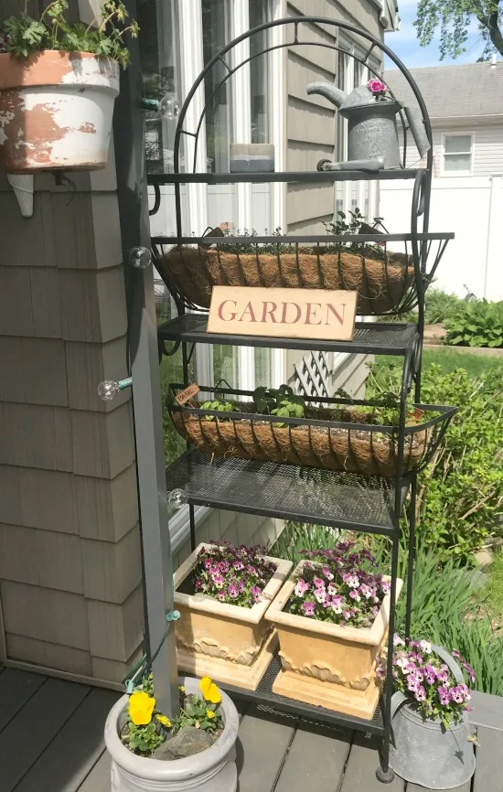 Baker's Rack Herb Garden using metal flower boxes