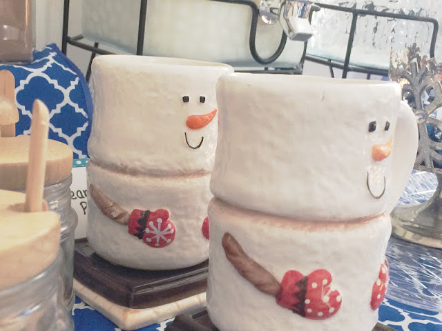 Keep warm this winter with a hot chocolate bar that will be as cute as it is helpful. With just a few items you may already have, you can make a super cute Snowman Hot Chocolate bar that will keep you warm when it's cold outside with a warm cup of cheer.