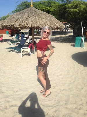 woman on sunny beach posing