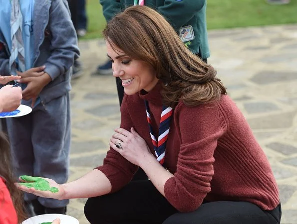 Kate Middleton is wearing her J Crew Mockneck sweater and Chloe boots