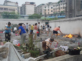 people making offerings for the Hungry Ghost Festival in Ganzhou