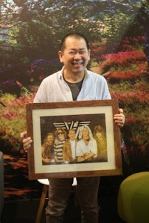 Yu at Gamescom with the Van Halen picture.