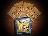 http://www.ernieball.com/products/electric-guitar-strings/1658/hybrid-slinky-nickel-wound
