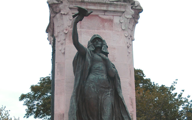 Statue of Peace on war memorial in Burton.  