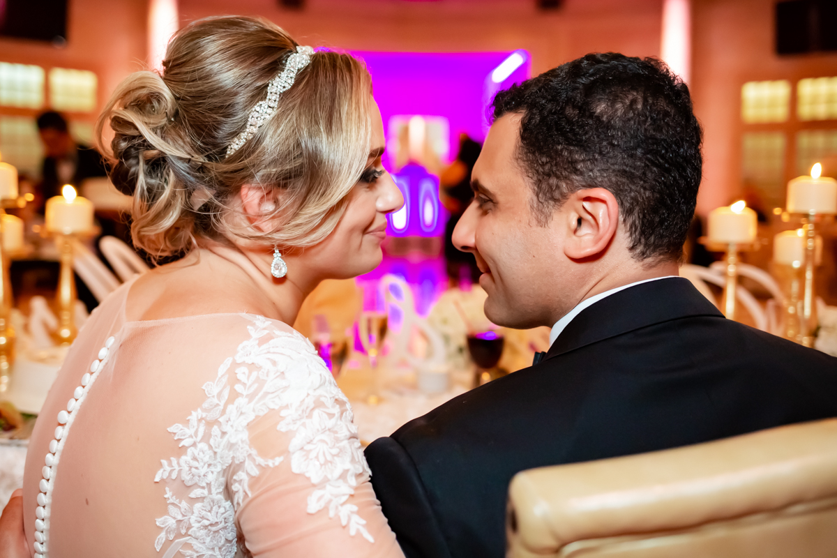 Bride and Groom Enjoying Happy Moments With Guests.