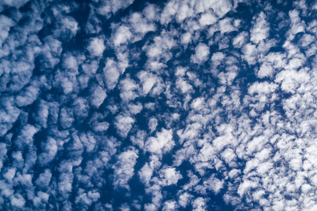 Photograph, Richard Kalvar: Clouds in the sky, Ile de Ré.