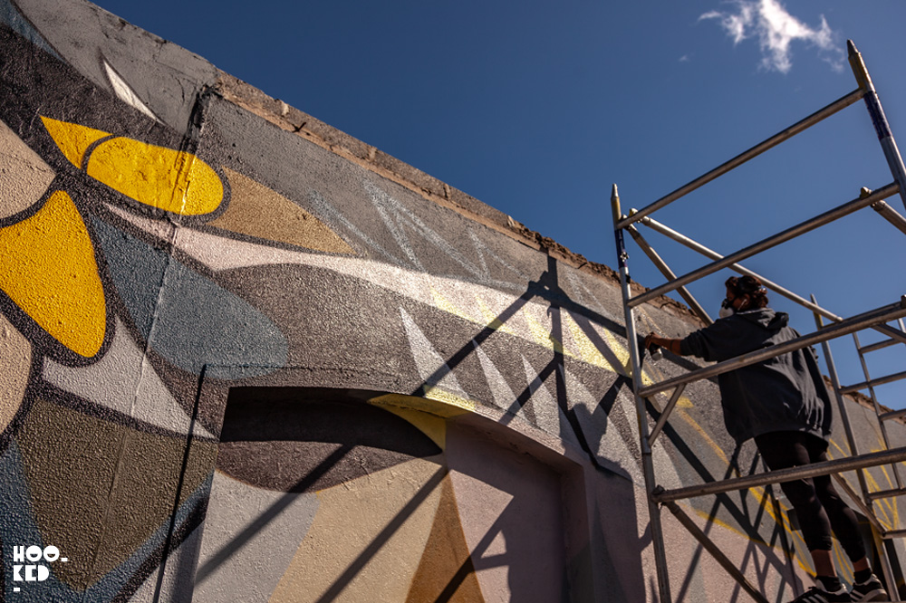 Indian-Canadian artist Fatspatrol at work on an owl mural in Waterford, Ireland Indian-Canadian artist Fatspatrol at work on an owl mural in Waterford Ireland