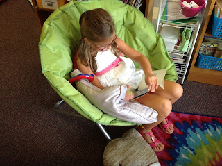 Independent reading in our reading nook, photo for The Schroeder Page, Back to School