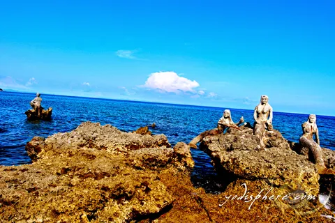 hover_share Three mermaids and a merman at the coast of Torrijos Freedom Park