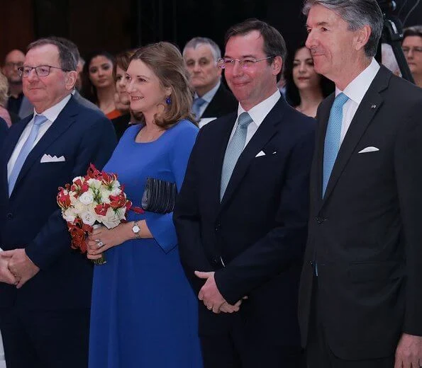 Princess Stephanie wore Seraphine royal blue tailored maternity dress. Kate Middleton, Duchess of Cambridge same Seraphine dress