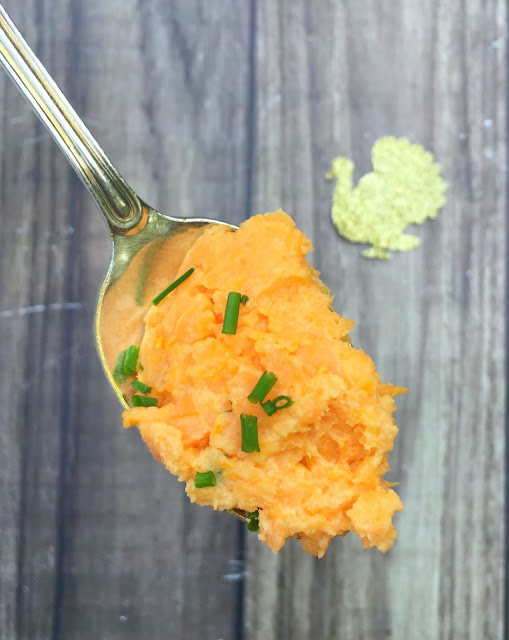 Mashed sweet potatoes with coconut yogurt and chives. The perfect Thanksgiving side dish recipe. | www.jacolynmurphy.com