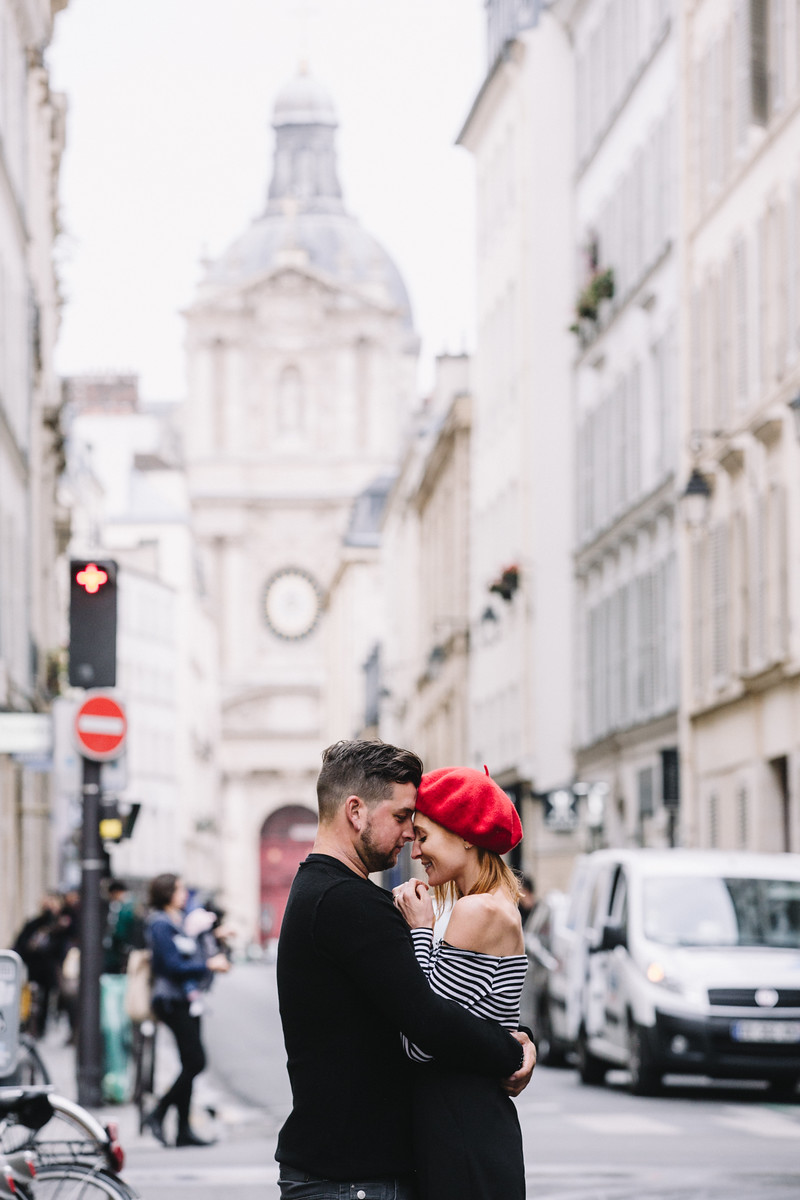 Paris Flytographer, red beret, strip shirt, engagement, couple in Paris, le marais 