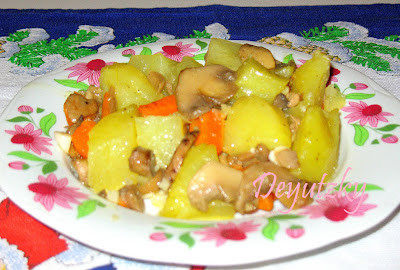 Cartofi cu ciuperci la cuptor